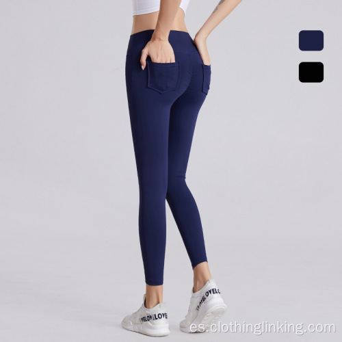 Pantalones de entrenamiento elásticos con bolsillo